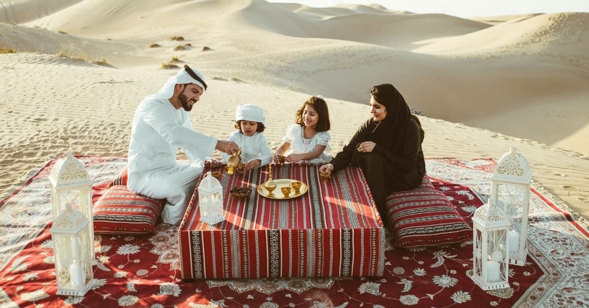Traditional Emirati majlis setup with Arabic coffee, dates, and a jar of raw honey